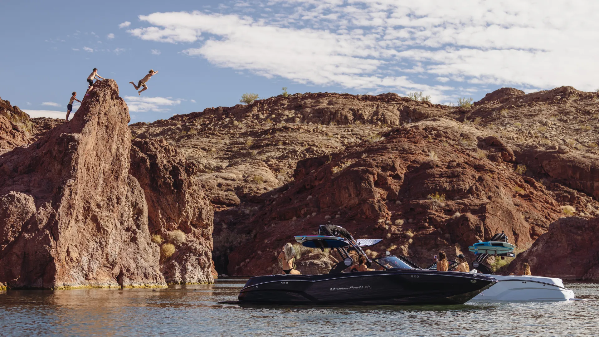 Picture of people jumping into the water from mountains